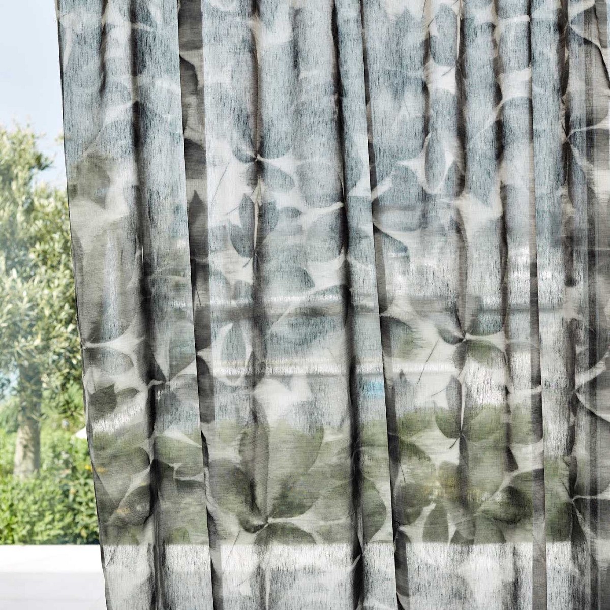 Grounded Sheer Black Earth Fabric by Harlequin